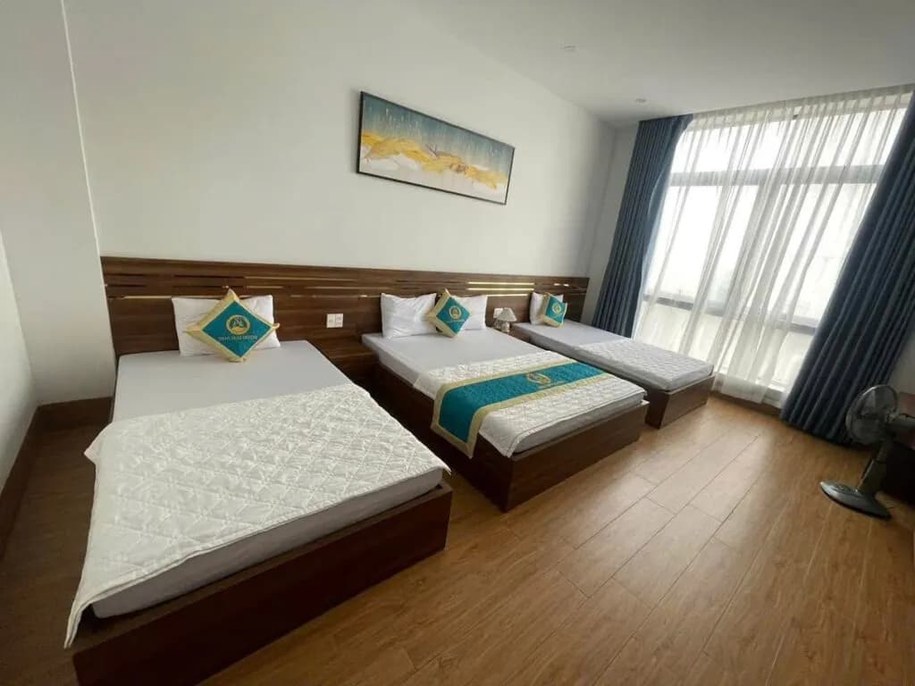 Khach san hoa mai phong gia dinh 4 tại Khách Sạn Hoa Mai, biển Quỳnh, Nghệ An